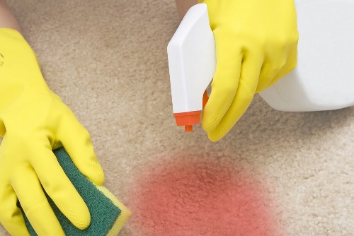 Cleaning professional preparing a Battersea home for a one-off deep clean